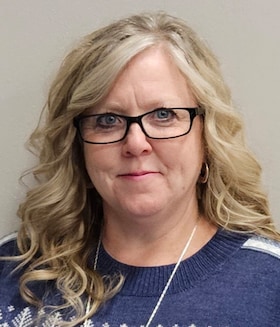 Staff member Regina Mullins from ID_b77c5c2ce69a